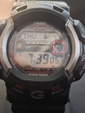 Casio Black Digital Watch with Red Accents